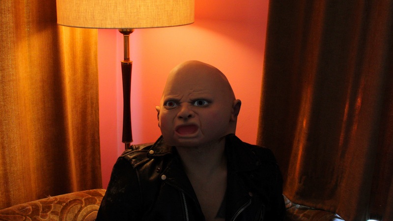 Ty Segall with a creepy baby mask