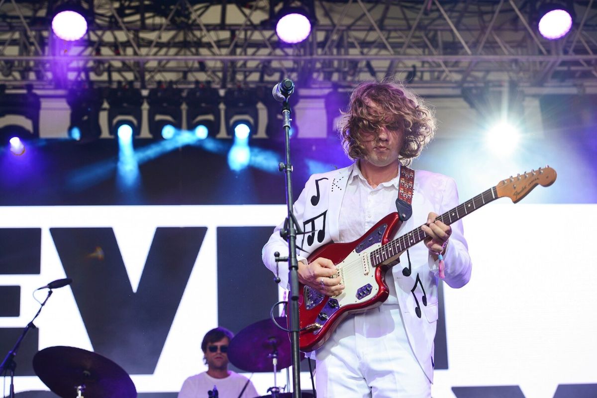 Kevin Morby tour dates suit auction