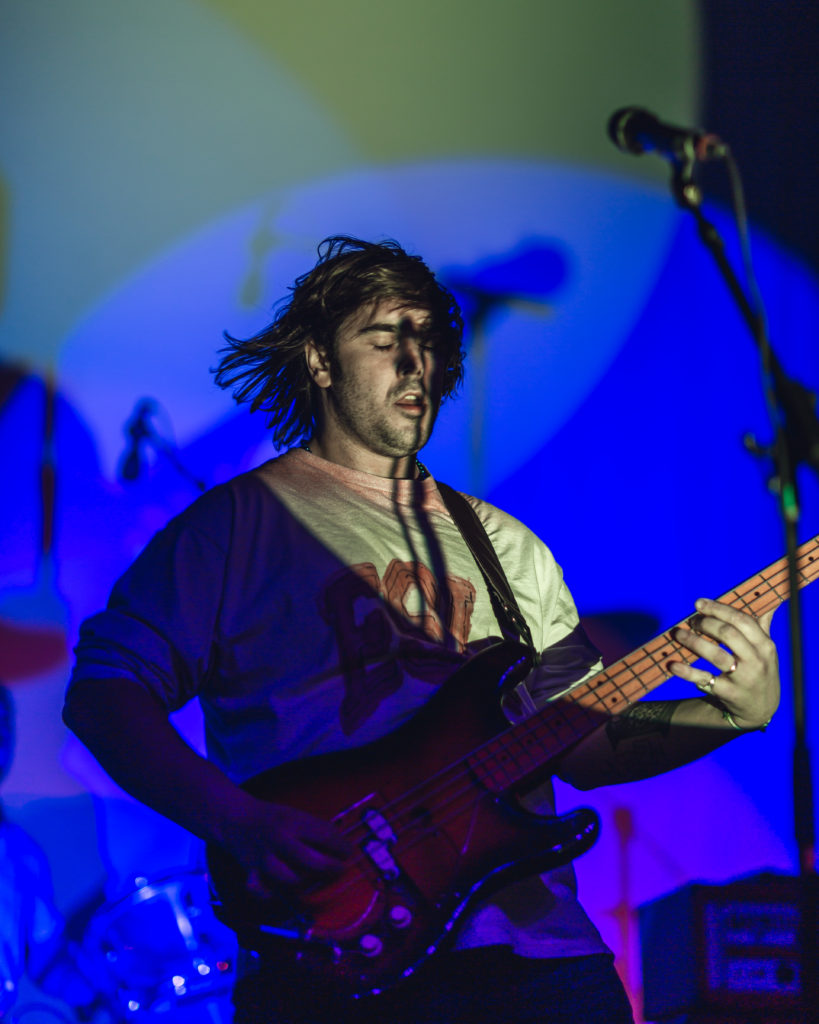 Bass player for Parquet Courts performs onstage in Brooklyn