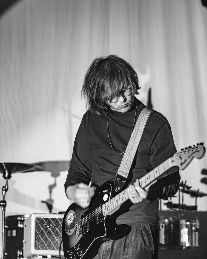 Guitar player for Parquet Courts performs onstage in Brooklyn