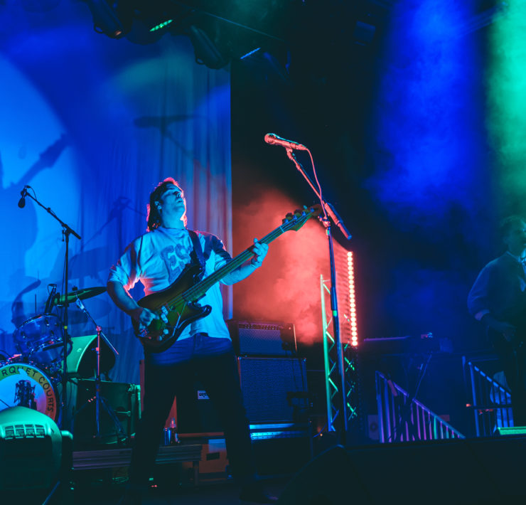 Bass player for Parquet Courts performs onstage in Brooklyn