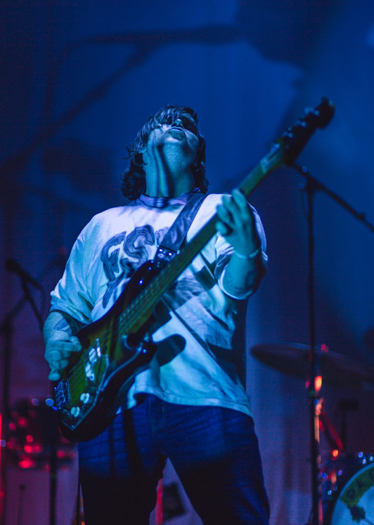 Bass player for Parquet Courts performs onstage in Brooklyn